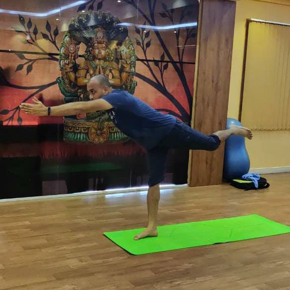 image of client doing yoga