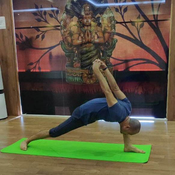 image of client doing yoga