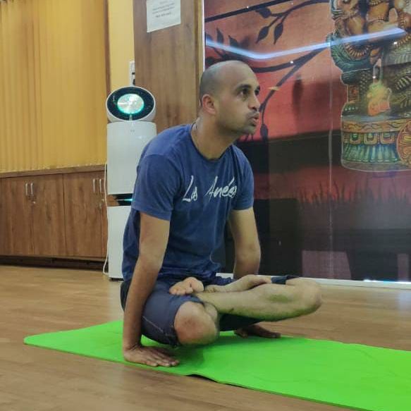 image of client doing yoga