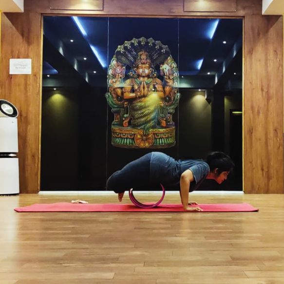 image of client doing yoga